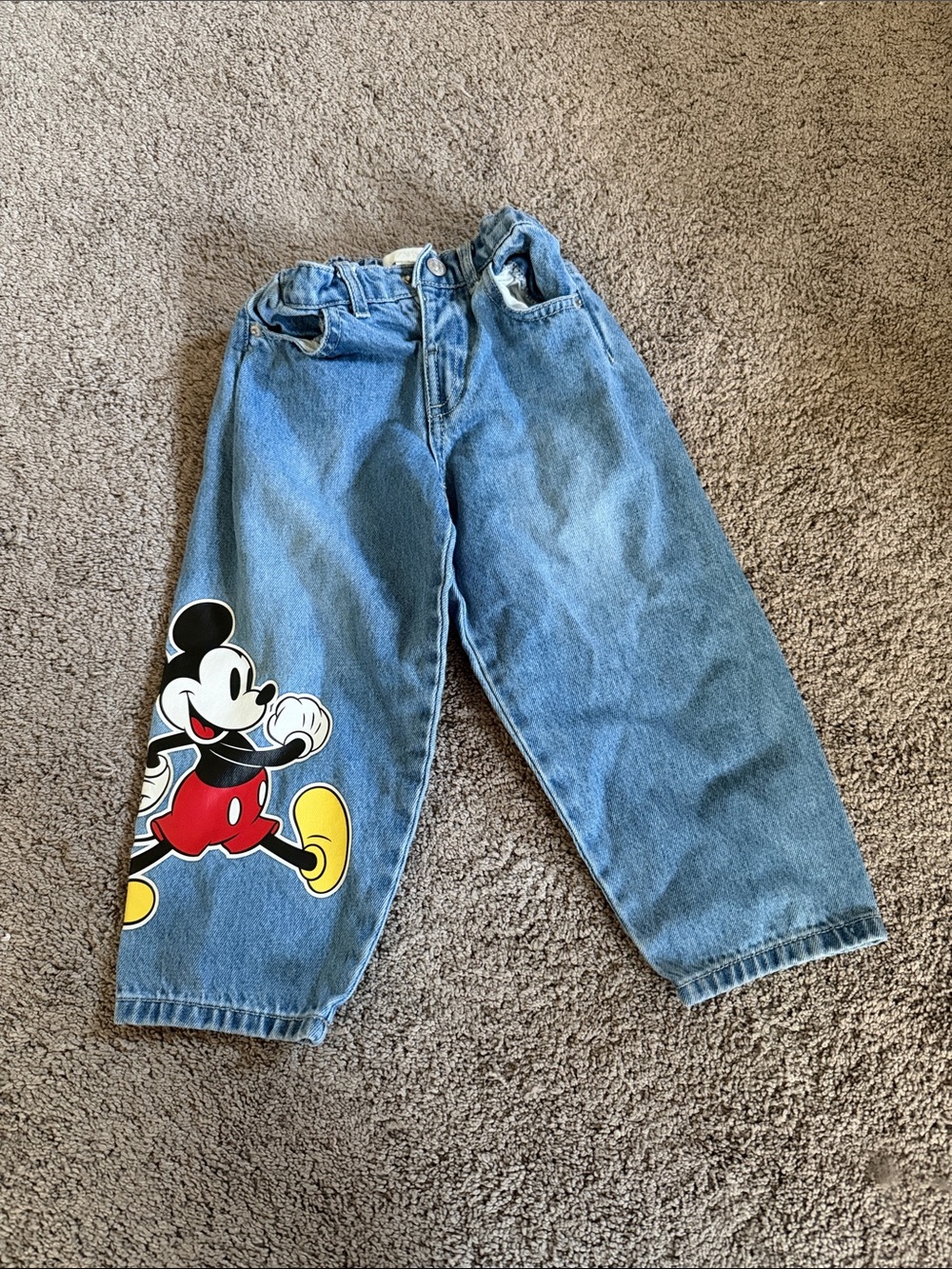 Zara Disney Light Blue Denim Jeans with Mickey Graphic and Red/Yellow Accents